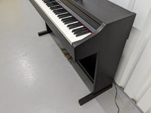 Load image into Gallery viewer, Roland RP301 digital piano in dark rosewood finish stock number 24209