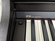 Load image into Gallery viewer, Roland RP301 digital piano in dark rosewood finish stock number 24209