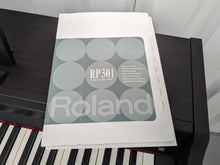 Load image into Gallery viewer, Roland RP301 digital piano in dark rosewood finish stock number 24209