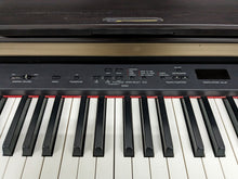 Load image into Gallery viewer, YAMAHA CLAVINOVA CLP-370 DIGITAL PIANO + STOOL IN DARK ROSEWOOD stock nr 24206