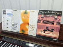 Load image into Gallery viewer, Yamaha Clavinova CLP-170 Digital Piano and stool in mahogany colour stock #24217