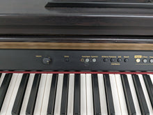 Load image into Gallery viewer, Roland HP102e digital piano and stool in dark rosewood finish stock number 24229