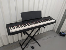 Load image into Gallery viewer, Yamaha P-115 digital portable piano with collapsible stand and pedal black stock #24227