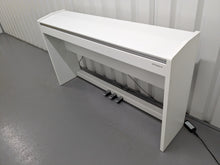Load image into Gallery viewer, Roland F140R Digital Piano in satin white slim line space saver stock # 24246