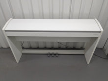 Load image into Gallery viewer, Roland F140R Digital Piano in satin white slim line space saver stock # 24246