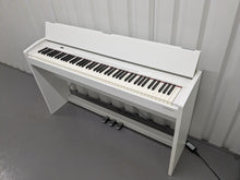 Load image into Gallery viewer, Roland F140R Digital Piano in satin white slim line space saver stock # 24246