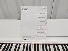 Load image into Gallery viewer, Roland F140R Digital Piano in satin white slim line space saver stock # 24246