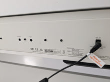 Load image into Gallery viewer, Roland F140R Digital Piano in satin white slim line space saver stock # 24246
