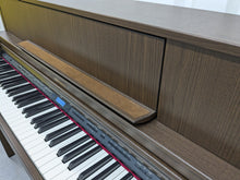 Load image into Gallery viewer, Roland LX-7 Luxury Digital Piano and stool in brown walnut finish Stock nr 24259