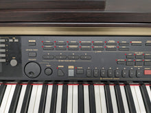 Load image into Gallery viewer, Yamaha Clavinova CVP-301 Digital Piano / arranger in rosewood. stock # 24255