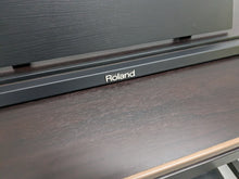 Load image into Gallery viewer, Roland HP101e Digital Piano in rosewood weighted keys 3 pedals, stock # 24264