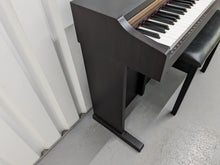 Load image into Gallery viewer, Roland HP101e Digital Piano in rosewood weighted keys 3 pedals, stock # 24264