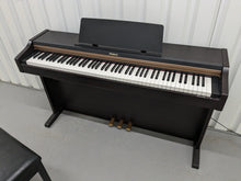 Load image into Gallery viewer, Roland HP101e Digital Piano in rosewood weighted keys 3 pedals, stock # 24264