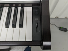 Load image into Gallery viewer, Kawai KDP110 digital piano and stool in rosewood finish stock number 24281