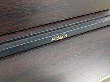 Load image into Gallery viewer, Roland HP101e Digital Piano in rosewood weighted keys 3 pedals, stock # 24272