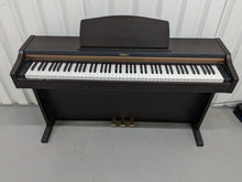 Load image into Gallery viewer, Roland HP101e Digital Piano in rosewood weighted keys 3 pedals, stock # 24272