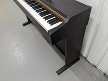 Load image into Gallery viewer, Roland HP101e Digital Piano in rosewood weighted keys 3 pedals, stock # 24272