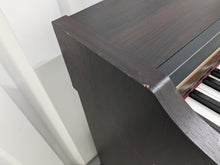 Load image into Gallery viewer, Roland HP101e Digital Piano in rosewood weighted keys 3 pedals, stock # 24272