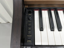 Load image into Gallery viewer, Roland HP101e Digital Piano in rosewood weighted keys 3 pedals, stock # 24272