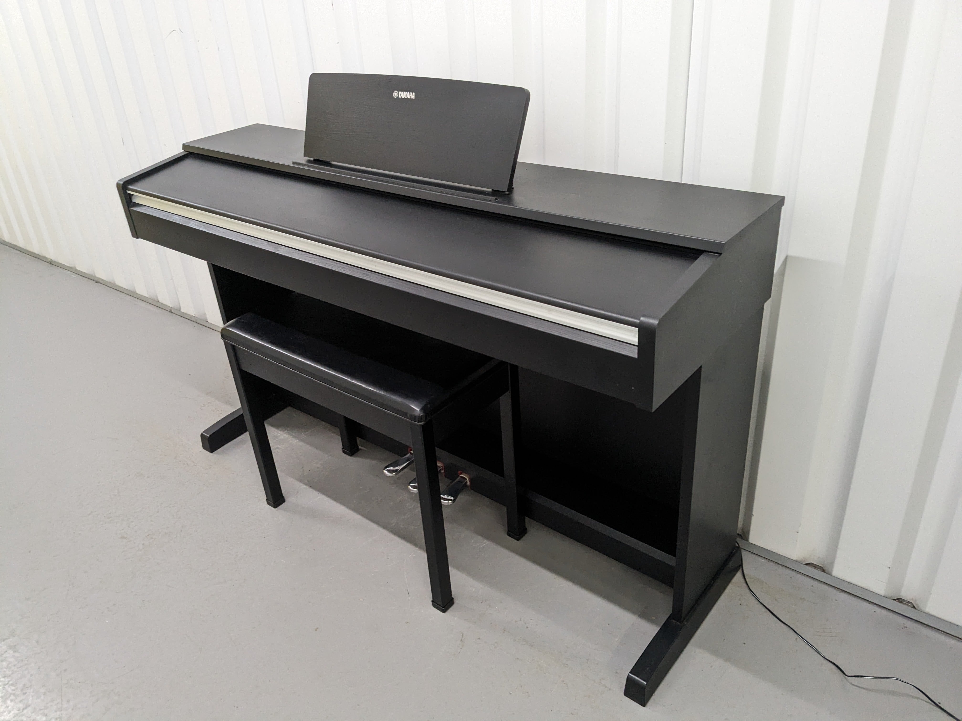 Yamaha Arius YDP142 Digital Piano and stool in satin black Stock numb Sulinda Music