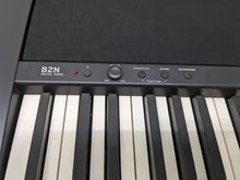 Load image into Gallery viewer, Korg B2N 88 Key portable lightweight Piano + stool + pedal stock #24273