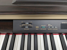 Load image into Gallery viewer, Yamaha Clavinova CLP-120 Digital Piano in dark rosewood stock #24285