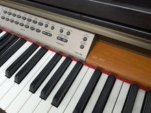 Load image into Gallery viewer, Yamaha Clavinova CLP-150 digital piano in dark rosewood finish stock #24234