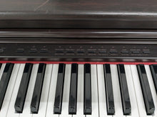 Load image into Gallery viewer, Casio Celviano AP-38 digital piano and stool in dark rosewood stock number 24308