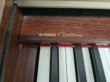 Load image into Gallery viewer, Yamaha Clavinova CLP-150 digital piano in mahogany finish stock #24314