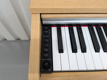 Load image into Gallery viewer, Yamaha Arius YDP-141 digital piano in cherry wood finish stock # 24329