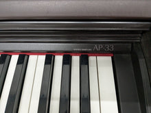 Load image into Gallery viewer, Casio Celviano AP-33 Digital Piano in rosewood, weighted keys Stock no 24334