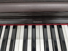 Load image into Gallery viewer, Casio Celviano AP-33 Digital Piano in rosewood, weighted keys Stock no 24334