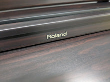 Load image into Gallery viewer, Roland HP103e digital piano in dark rosewood finish stock number 24333