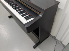 Load image into Gallery viewer, Roland HP103e digital piano in dark rosewood finish stock number 24333