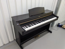 Load image into Gallery viewer, Roland HP103e digital piano in dark rosewood finish stock number 24333