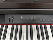 Load image into Gallery viewer, Yamaha Clavinova CLP-840 Digital Piano in dark rosewood finish stock # 24289