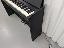 Load image into Gallery viewer, Roland F120R compact slim size Digital Piano in black finish stock # 24337