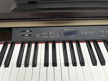 Load image into Gallery viewer, Yamaha Clavinova CLP-120 Digital Piano and stool in dark rosewood stock #24346
