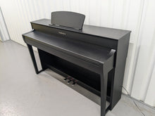 Load image into Gallery viewer, Yamaha Clavinova CLP-735 in satin black with stool and manuals stock nr 24354
