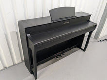 Load image into Gallery viewer, Yamaha Clavinova CLP-735 in satin black with stool and manuals stock nr 24354
