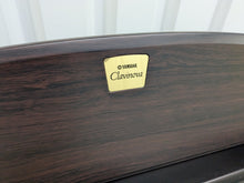 Load image into Gallery viewer, Yamaha Clavinova CLP-130 Digital Piano in dark rosewood stock #24358