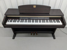 Load image into Gallery viewer, Yamaha Clavinova CLP-130 Digital Piano in dark rosewood stock #24358