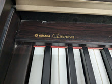 Load image into Gallery viewer, Yamaha Clavinova CLP-130 Digital Piano in dark rosewood stock #24358