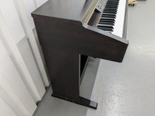 Load image into Gallery viewer, Yamaha Clavinova CLP-130 Digital Piano in dark rosewood stock #24358