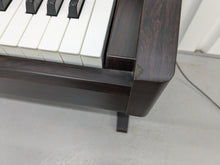 Load image into Gallery viewer, Yamaha Clavinova CLP-130 Digital Piano in dark rosewood stock #24358