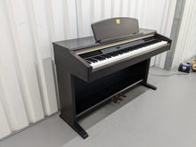 Load image into Gallery viewer, Yamaha Clavinova CLP-130 Digital Piano in dark rosewood stock #24358