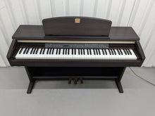 Load image into Gallery viewer, Yamaha Clavinova CLP-130 Digital Piano in dark rosewood stock #24358