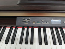 Load image into Gallery viewer, Yamaha Clavinova CLP-120 Digital Piano and stool in dark rosewood stock #24367