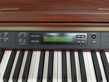 Load image into Gallery viewer, YAMAHA CLAVINOVA CLP-270 DIGITAL PIANO AND STOOL IN MAHOGANY FINISH stock #24359