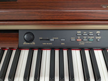 Load image into Gallery viewer, YAMAHA CLAVINOVA CLP-270 DIGITAL PIANO AND STOOL IN MAHOGANY FINISH stock #24359